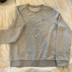 Classic Women’s Lacoste sweatshirt.  EUC Size 42, imo fits like a Women’s Medium